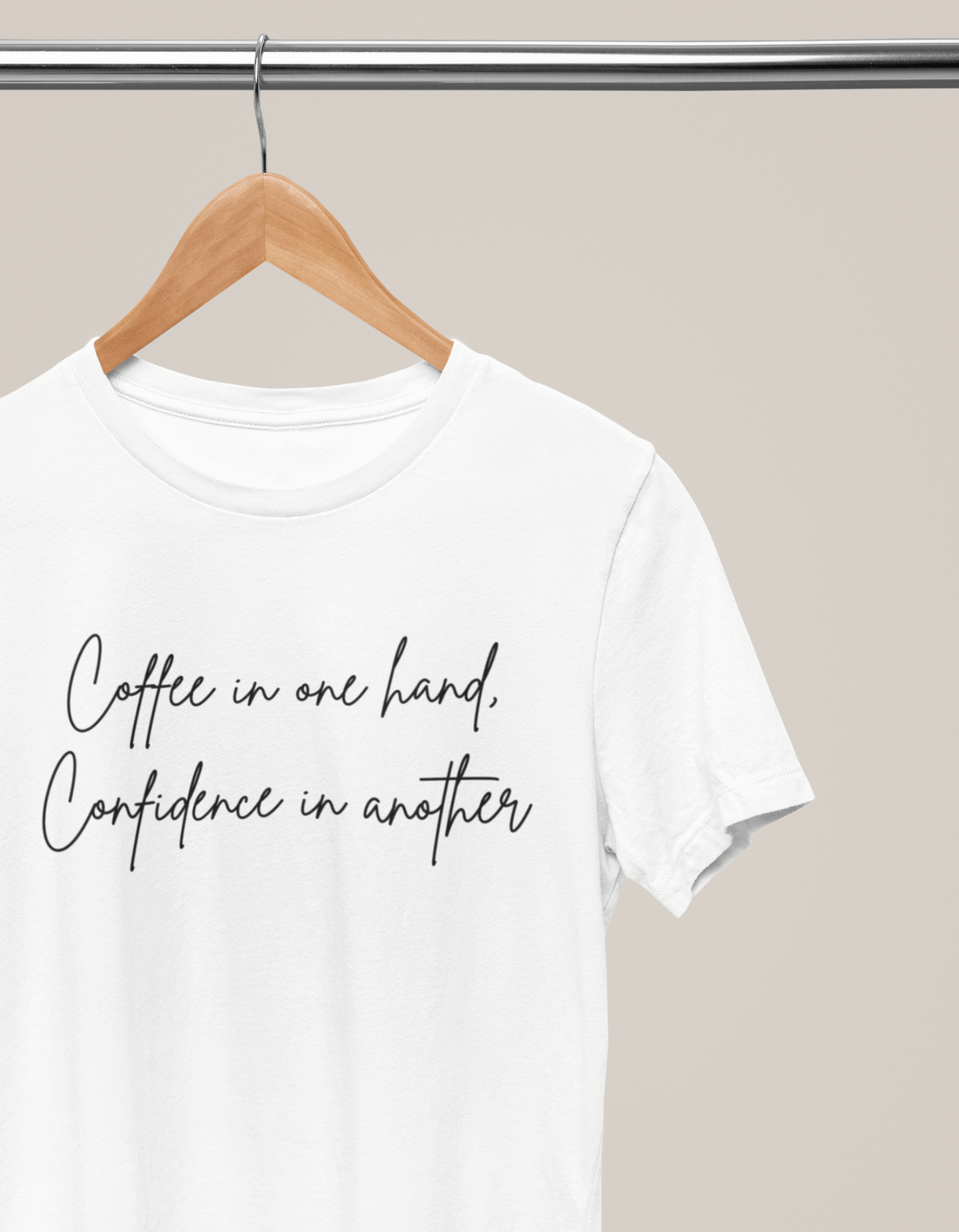 COFFEE IN ONE HAND, CONFIDENCE IN ANOTHER